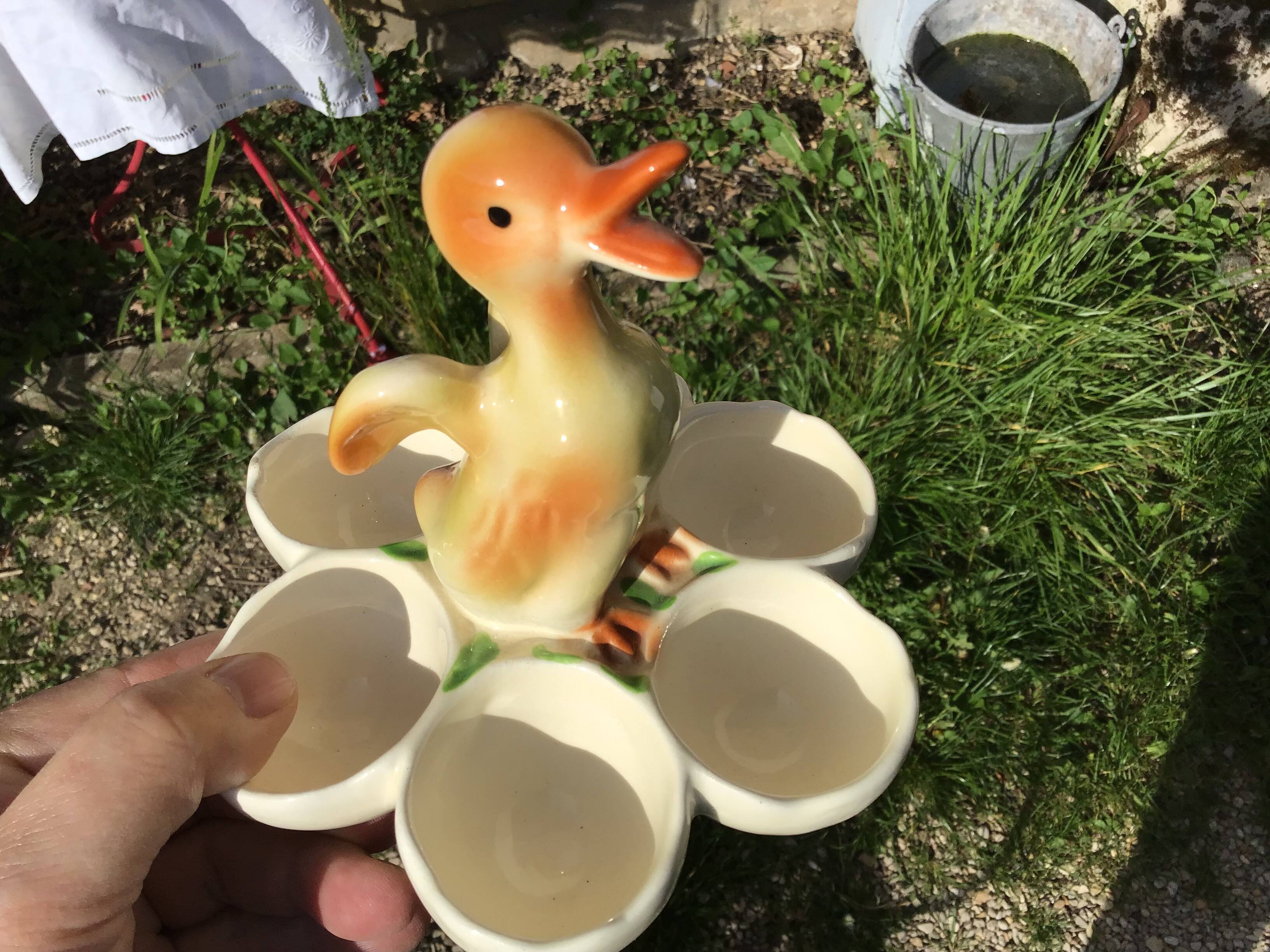 Egg cup with central chick decoration