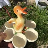 Egg cup with central chick decoration