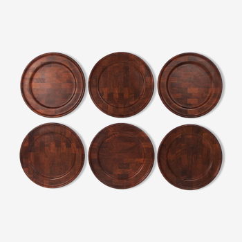 Set of six rosewood plates by Digsmed