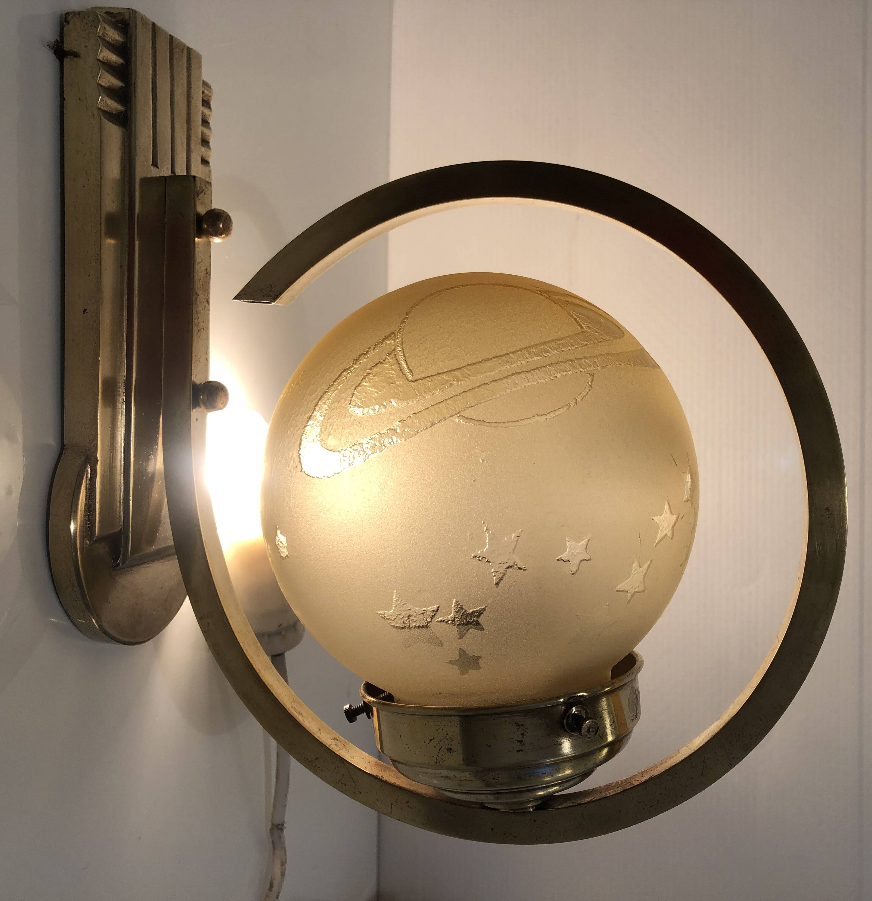 Art Deco wall light 1930-40 signed Deveau brass and glass engraved with stars and planets motif