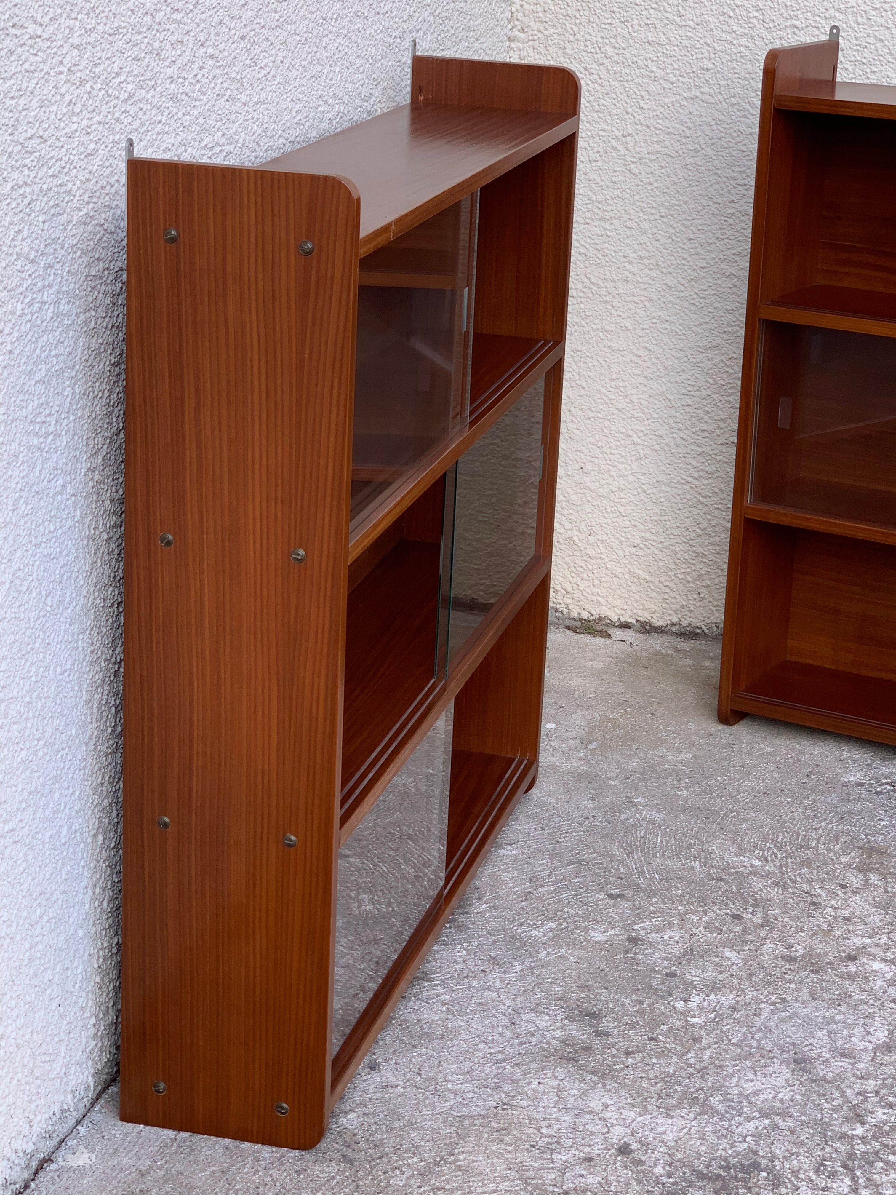 glass wall bookcase in vintage teak 1950