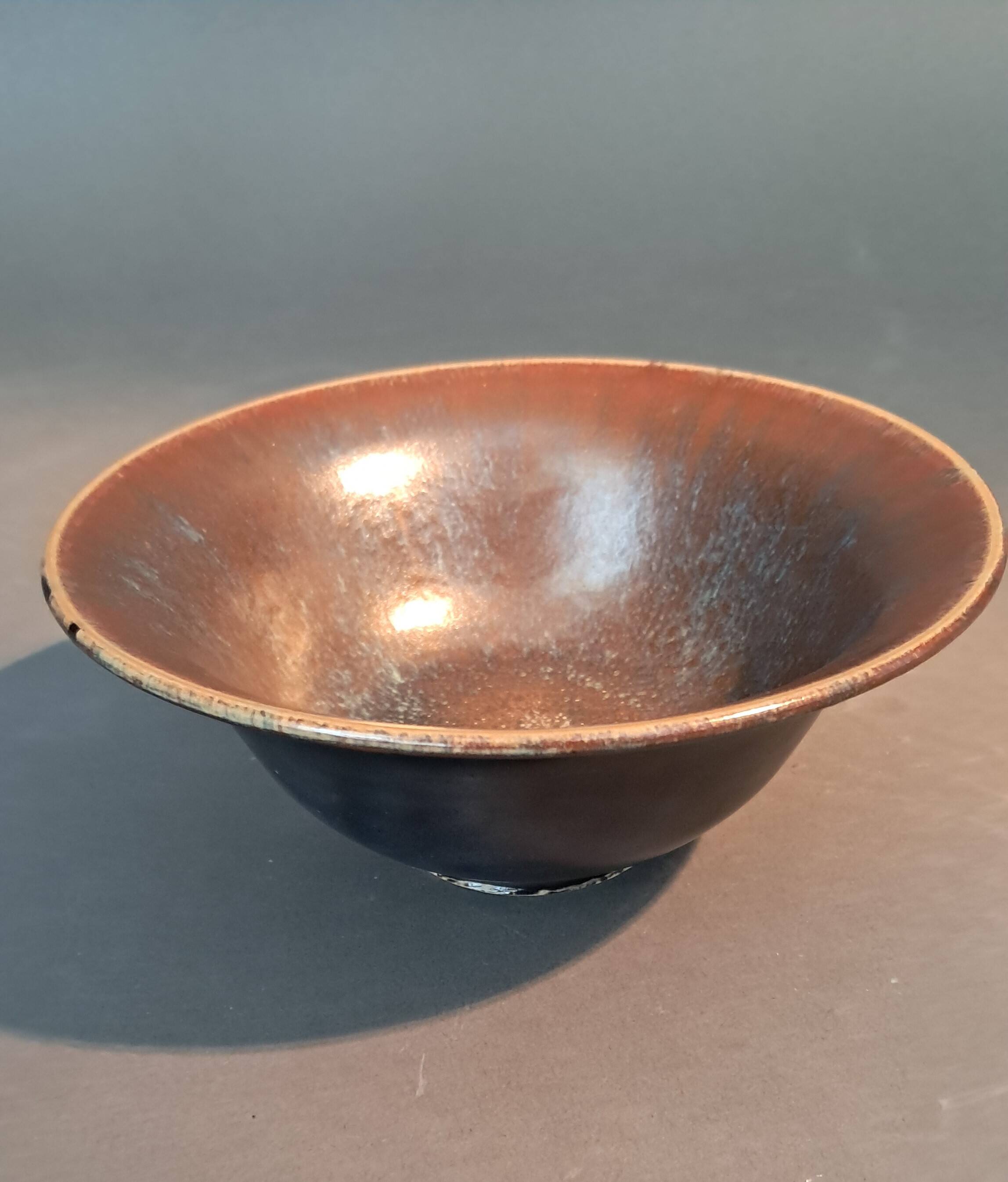 Flared cup in black and nuanced brown enameled ceramic, numbered and Sèvres stamp