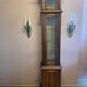 Walnut showcase, grooved uprights, 4 glass shelves