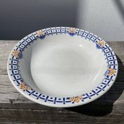Round, shallow ceramic salad bowl from Saint Amand
