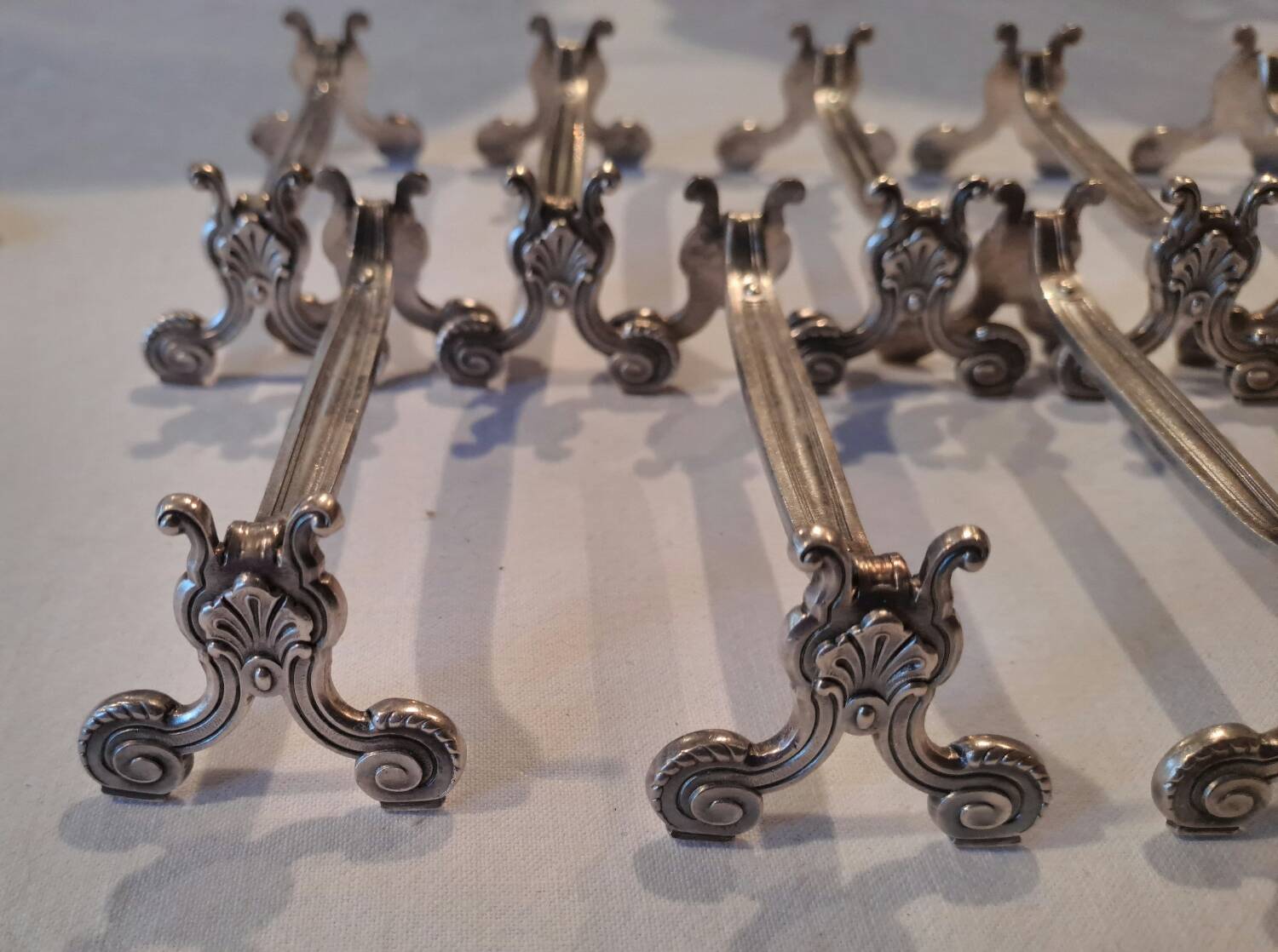 12 Christofle silver metal knife holders, Vendôme model