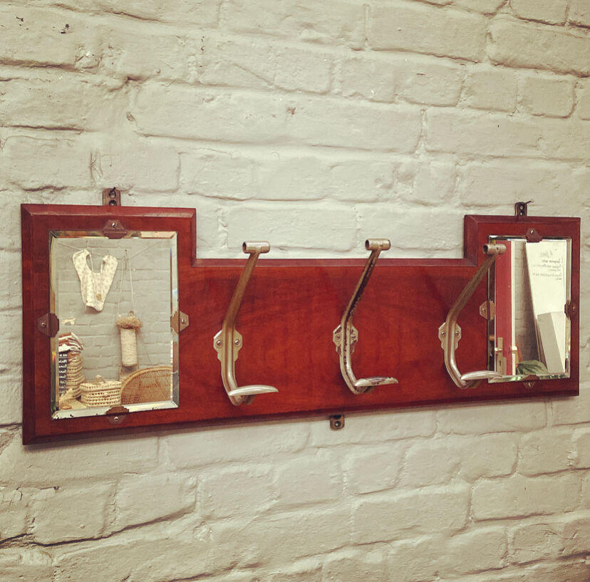 Mirror coat rack
