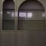 Showcases in lacquered wood, glass and brass  1970s, set of 4