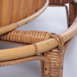 Vintage bamboo Tiki bar cocktail bar with 2 bar stools.