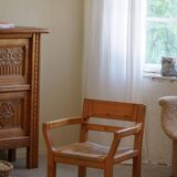 Tage Poulsen, a pair of brutalist chairs in pine and cord, Danish modern style, 1970s.
