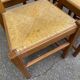 4 solid wood and straw chairs, farmhouse style from the 1950s.