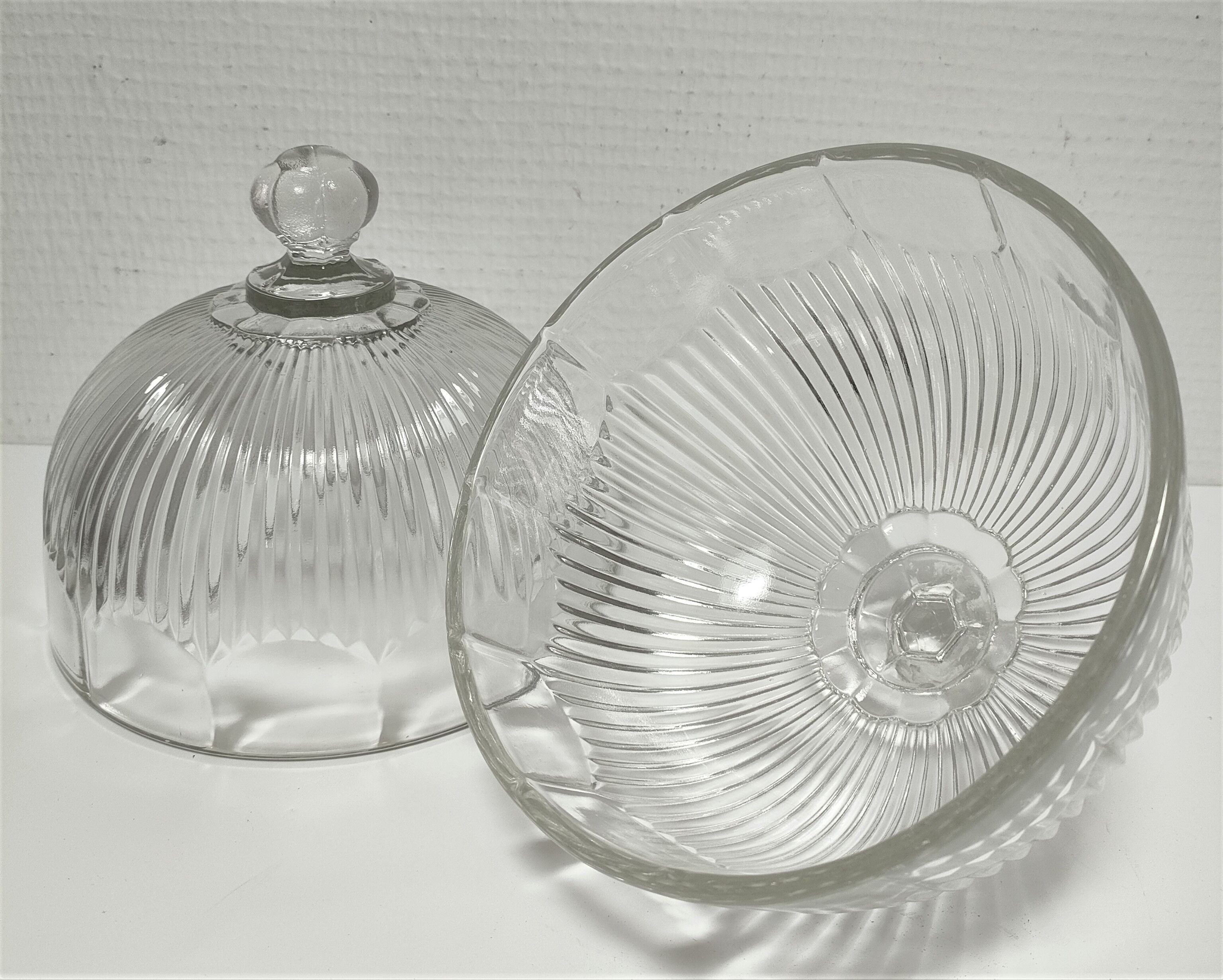 Two cheese bells molded pressed glass striated Art Deco style early twentieth century