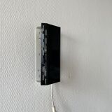 Applique à volet pivotant moderniste