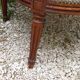 Pair of Louis XVI style medallion armchairs