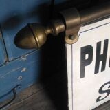 Photographer enamel sign