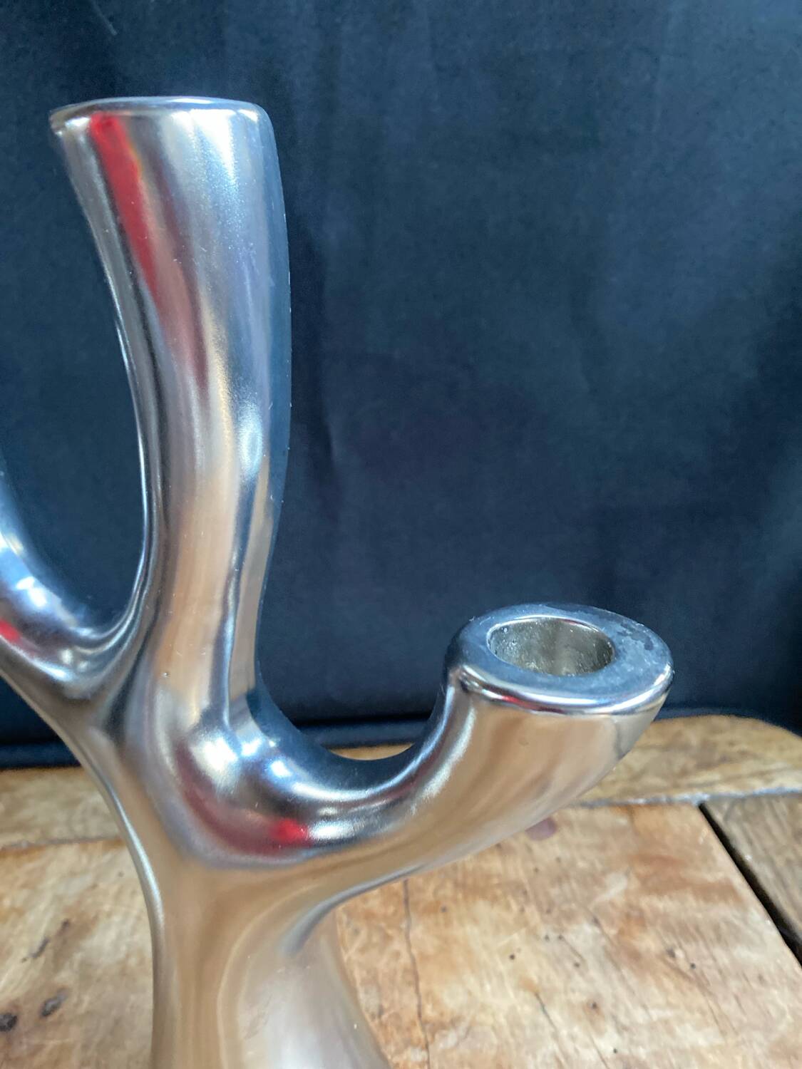 Silver candlesticks in the shape of a 3-branch tree