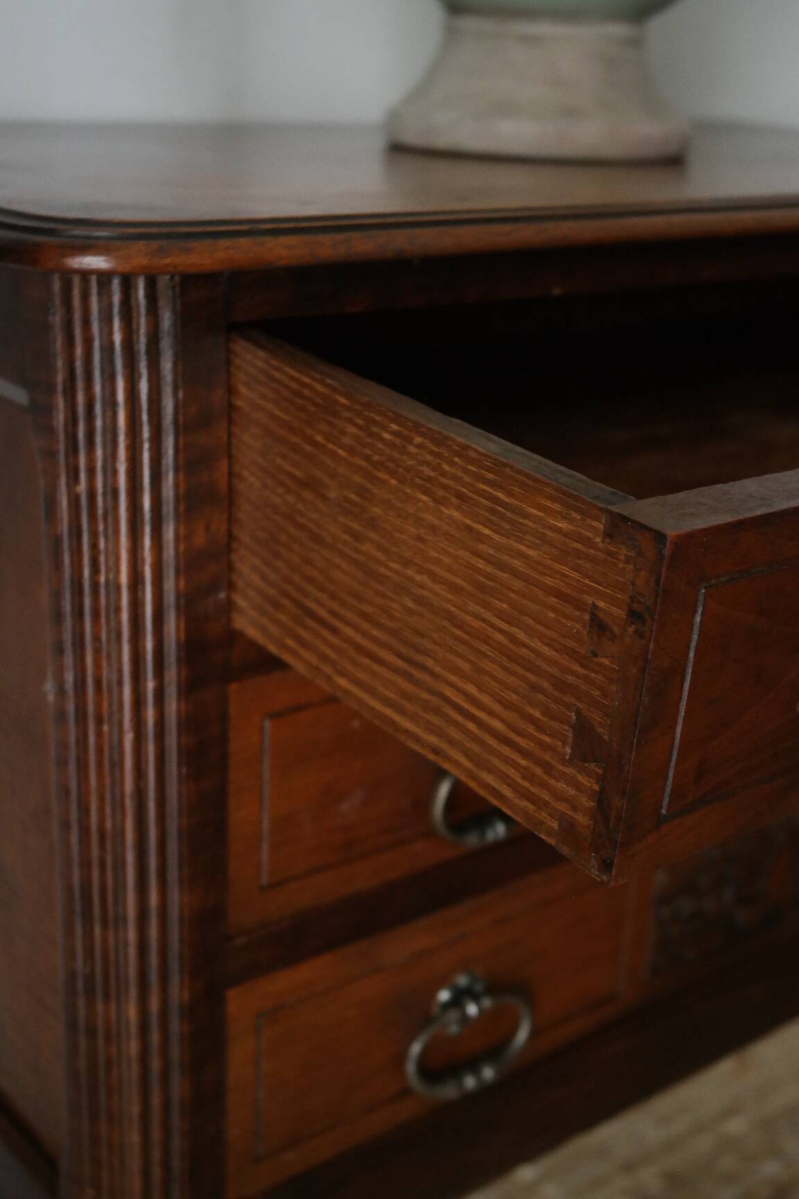 Solid walnut chest of drawers from the early 20th century.