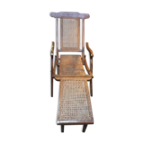 Ancienne chaise longue de paquebot cannée