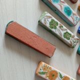 Set of 12 terracotta knife holders