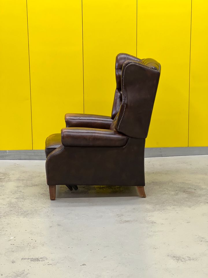 Brown vintage handmade chesterfield recliner armchair