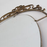 Oval mirror in art deco brass, Italy 1940s.