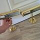 Old pair of gilded brass wall sconces / night lights from the 70s
