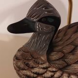 Decorative table lamp with a sculpted duck-shaped base and painted finish.
