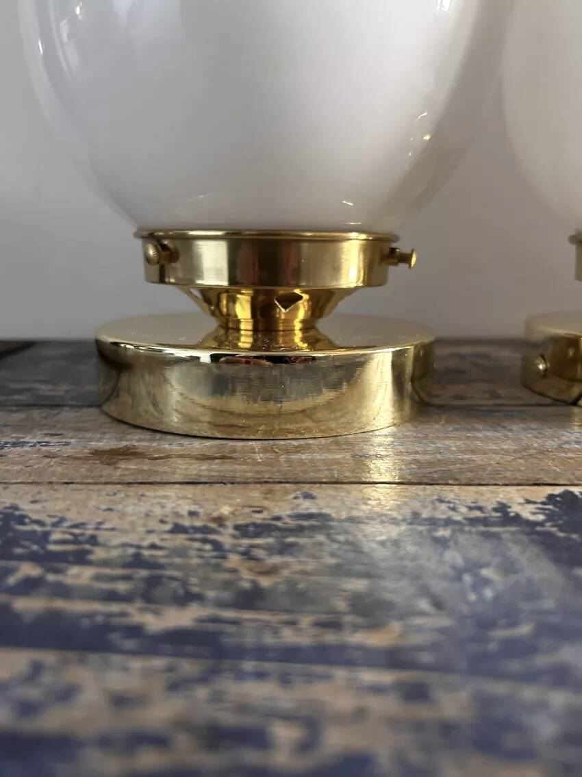 Set of two white opaline ball wall lights