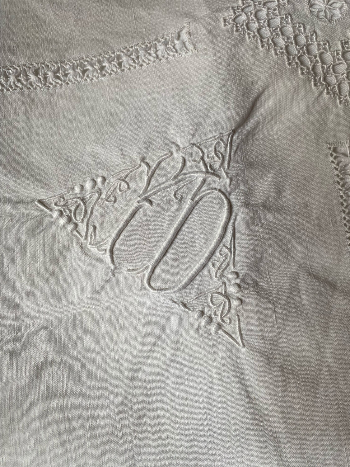 Pair of old cotton embroidered pillowcases with monograms.