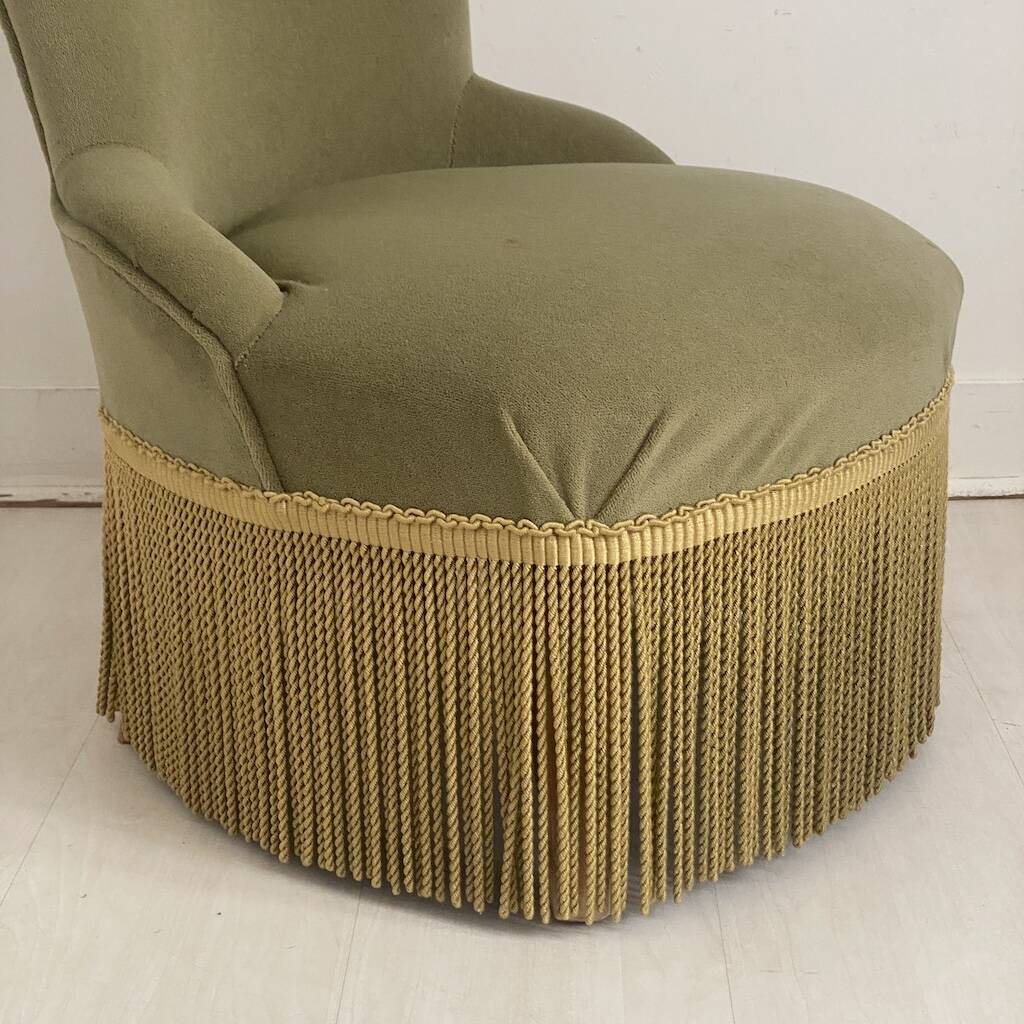 Small green velvet tub chair