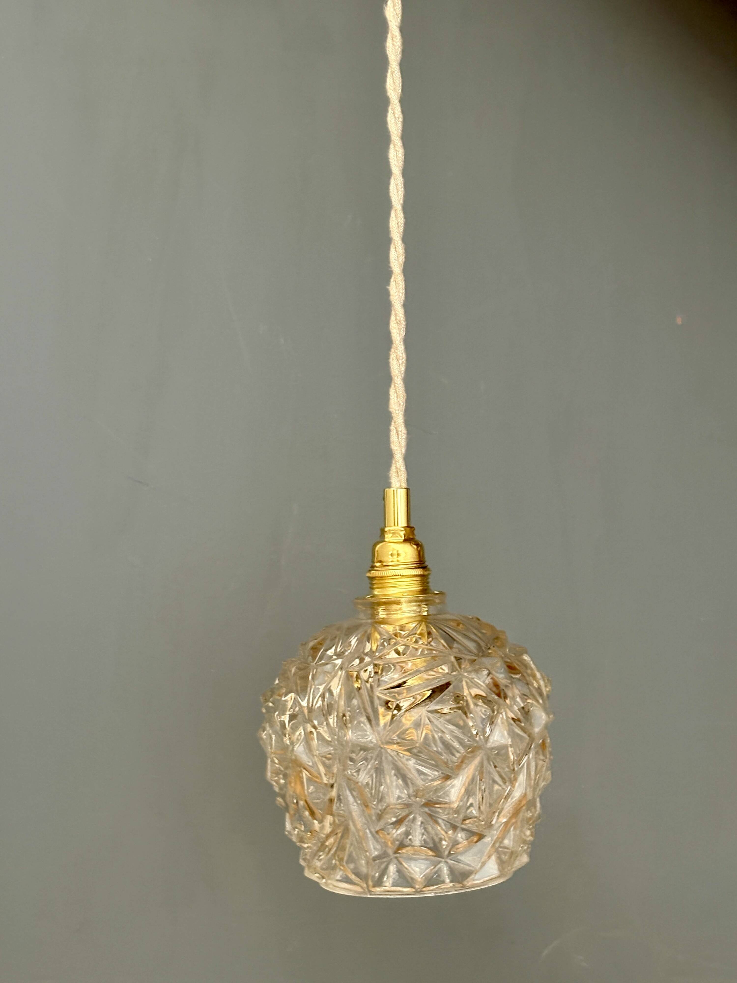 Vintage moulded glass suspension globe