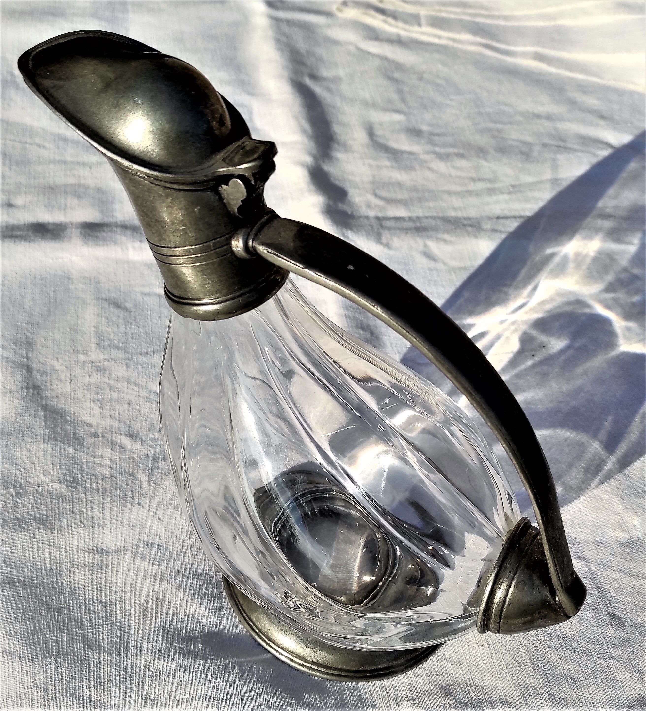 Old duck shaped decanter in crystal and tin