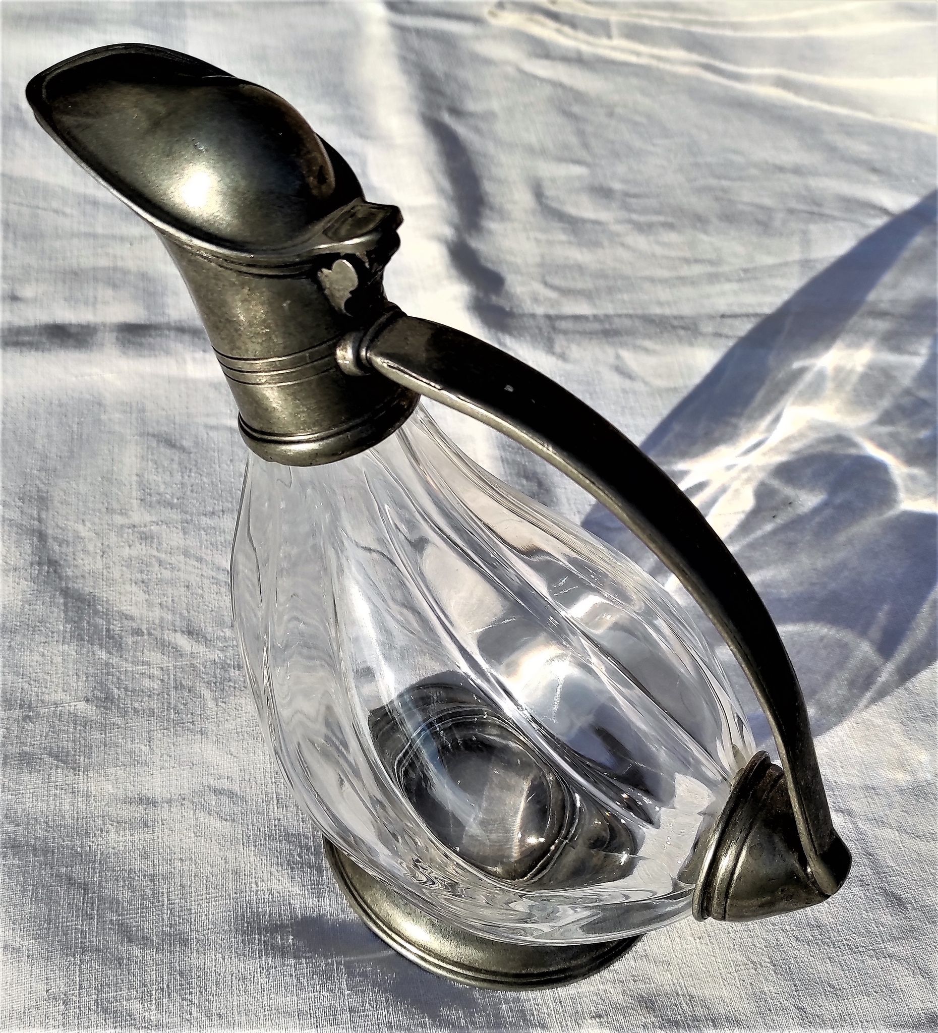 Old duck shaped decanter in crystal and tin