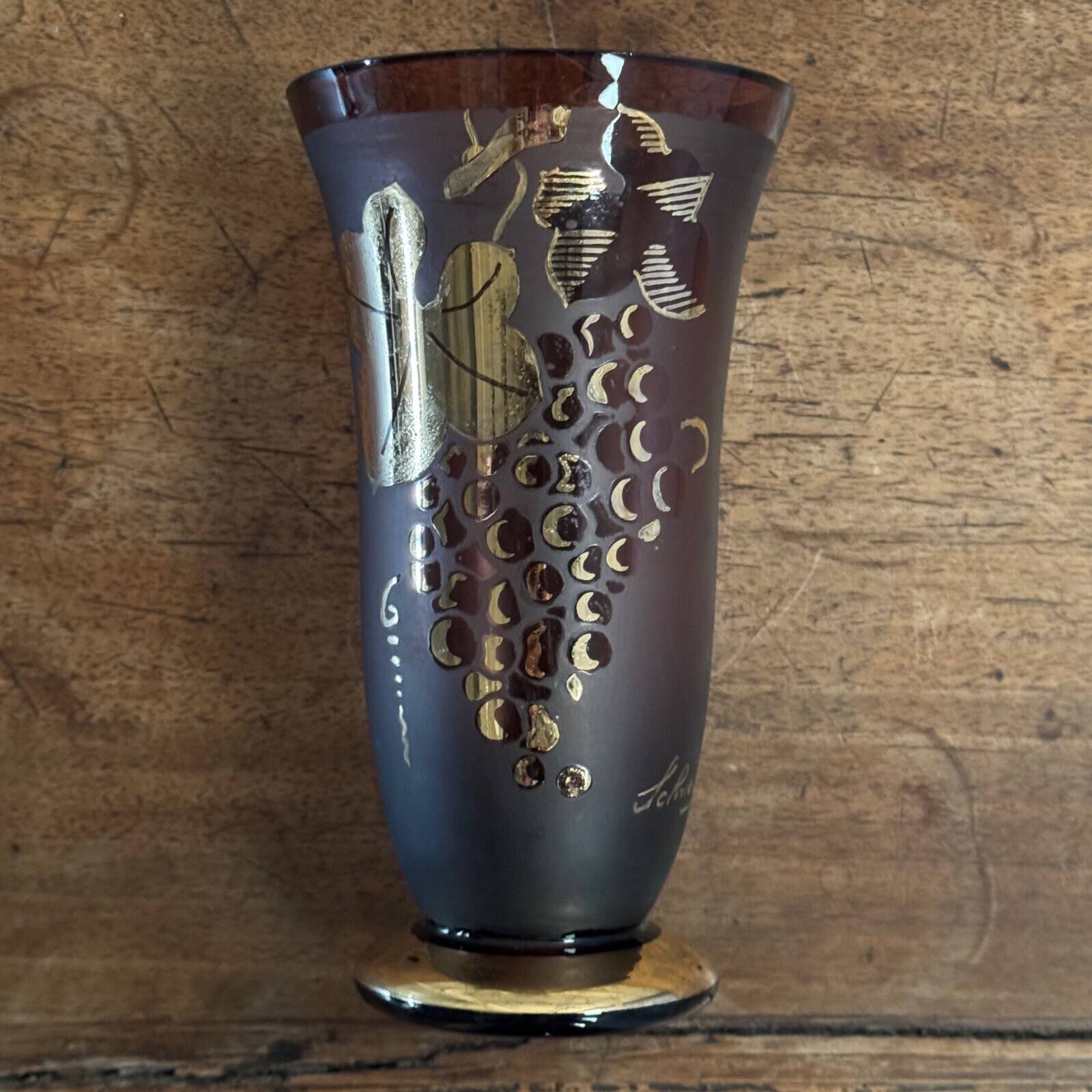 Frosted Shneider vase with pink background enhanced with golden vine leaves