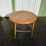 Rattan side table with round woven top