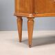 Pair of wooden and glass bedside tables from the 1950s.