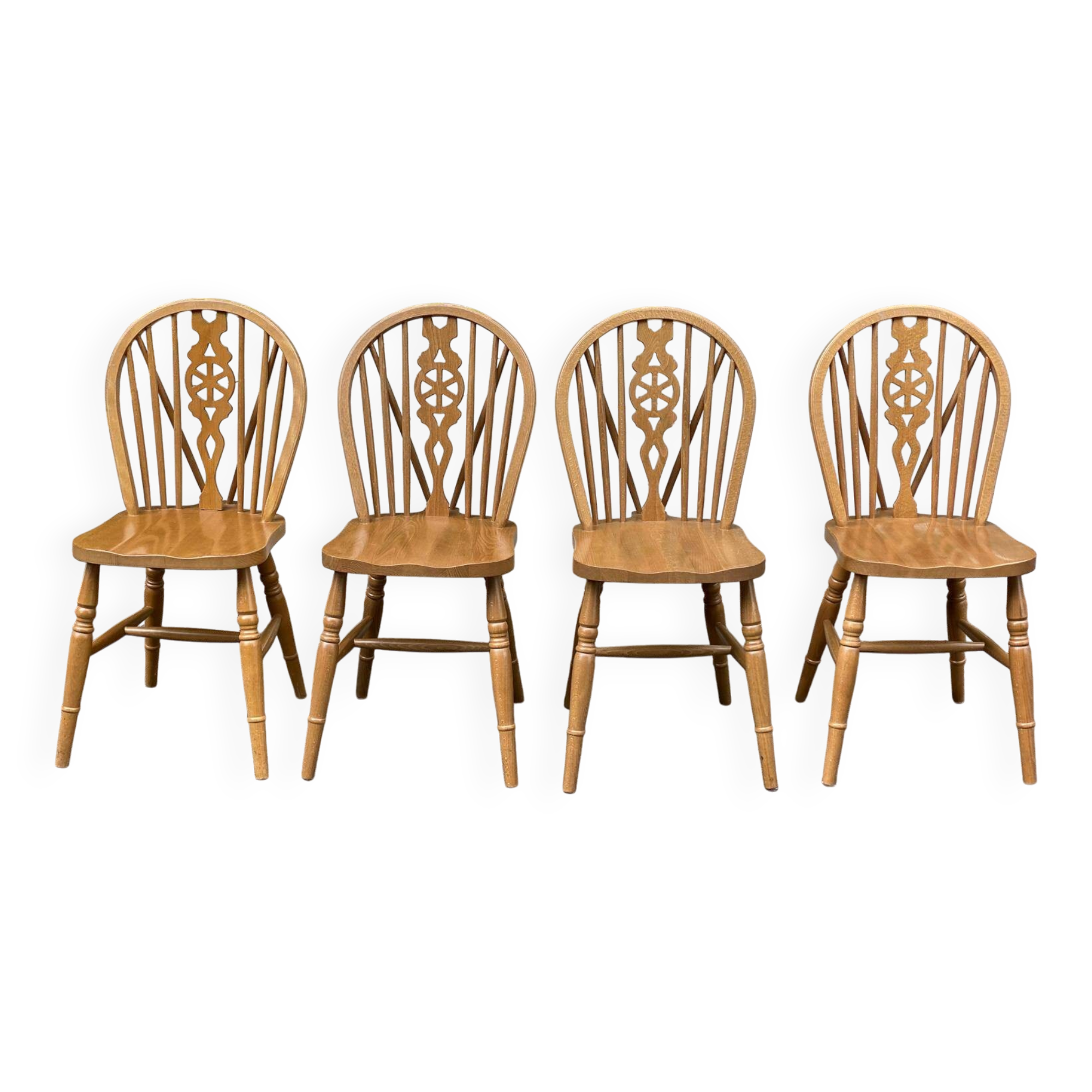 4 Windsor Wheelback English chairs in solid curved wood interior's