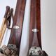 Antique wooden skis with vintage poles