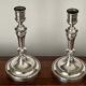 Pair of Christofle silver metal candle holders.