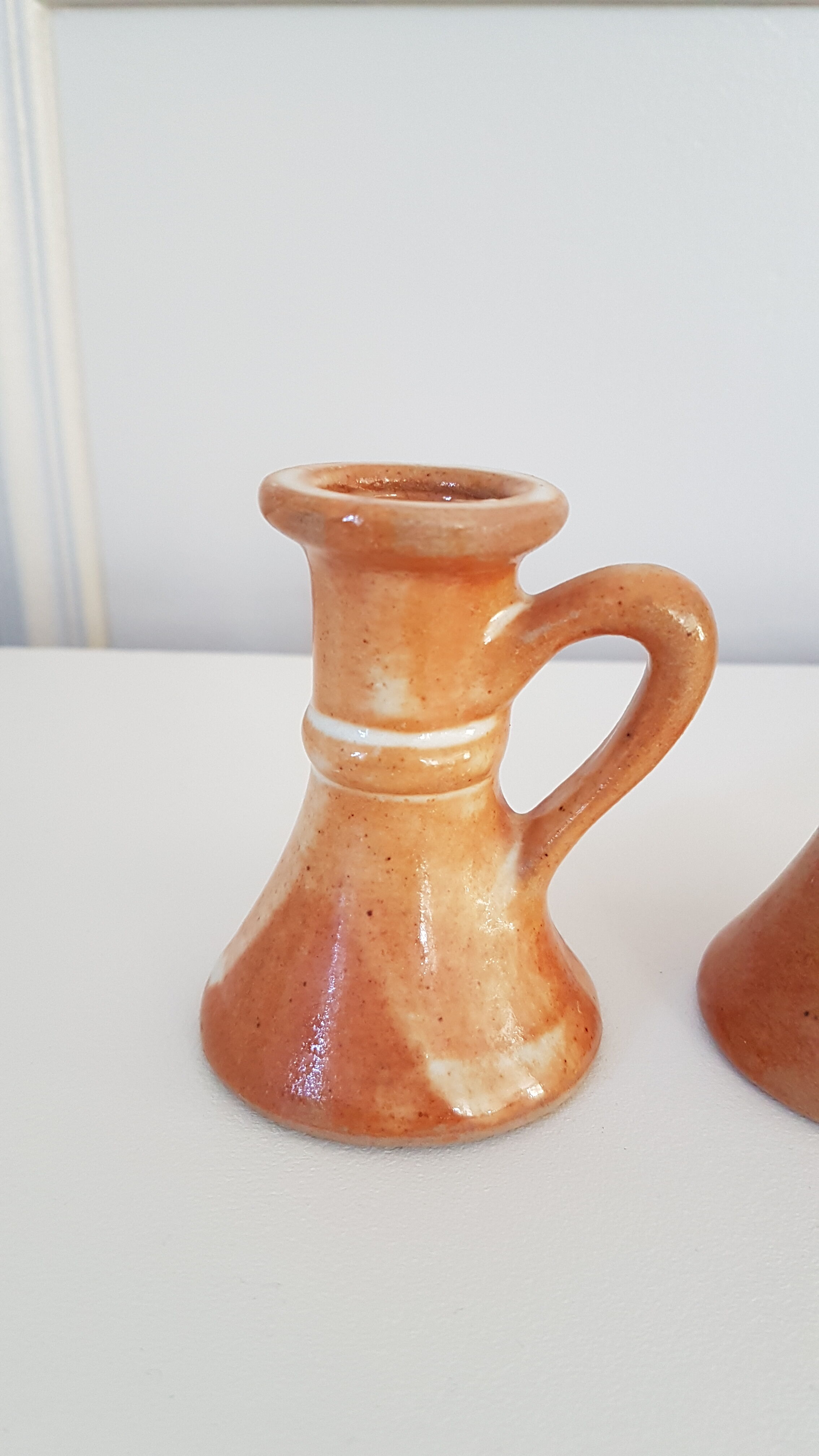 Duo of stoneware candle holders