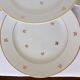 Set of 4 vintage flat plates in Badonviller porcelain