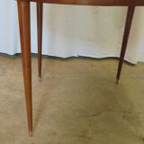 Mahogany round table with 4 extensions from the 1950s