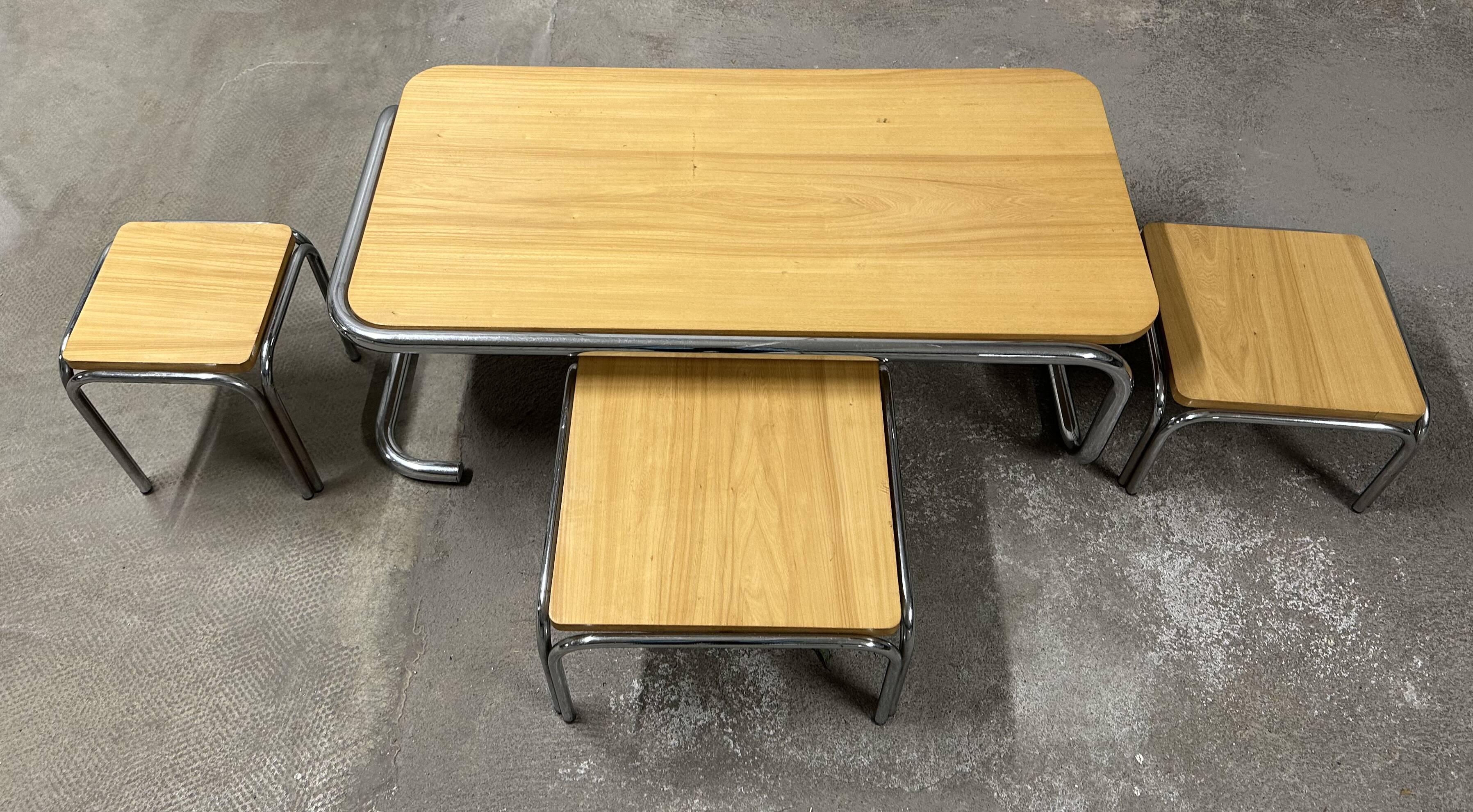 Set of 4 nesting coffee tables from the 70s, metal and solid oak.