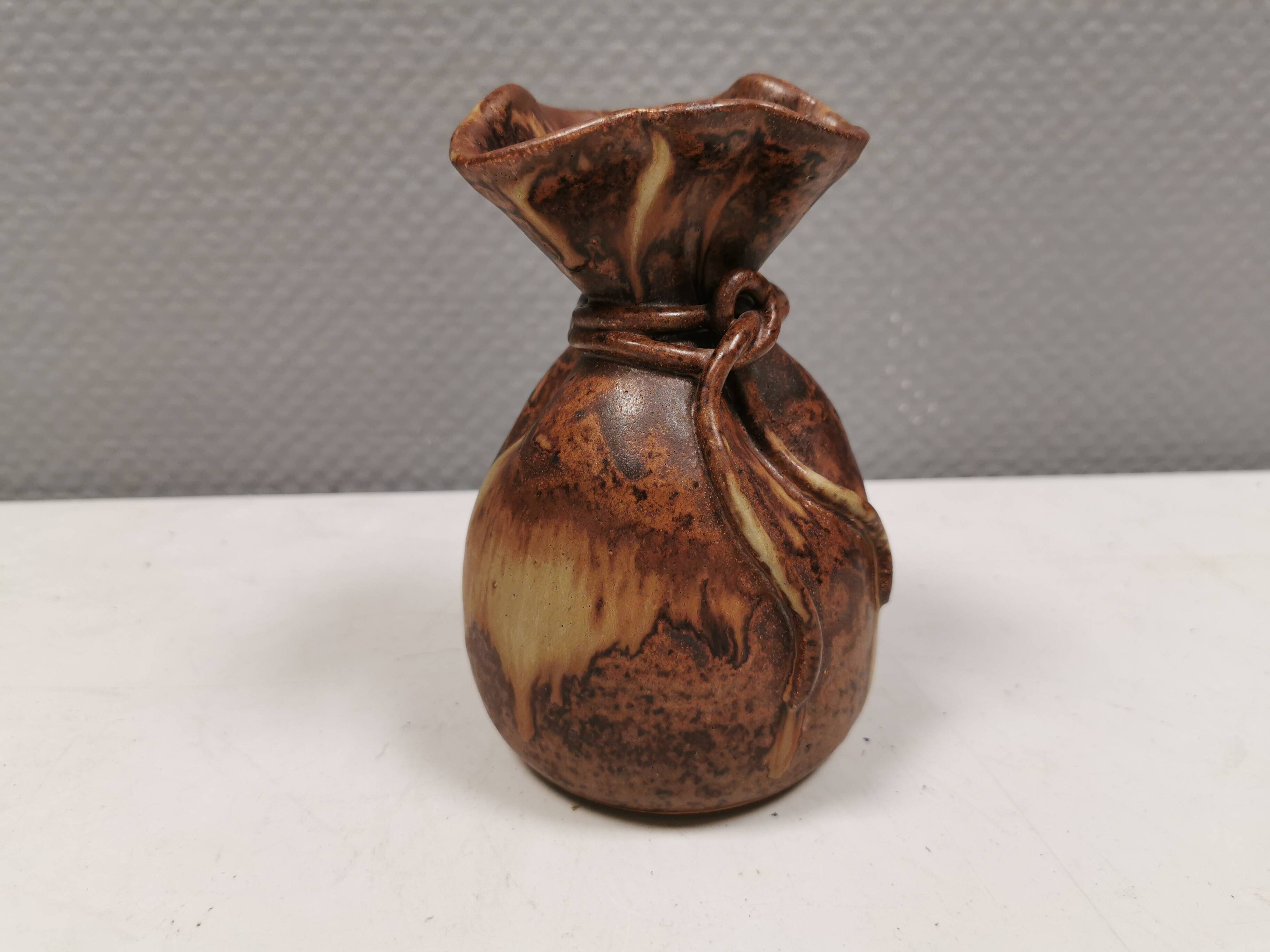 vase shaped like a money bag, in beautiful earthy colours.