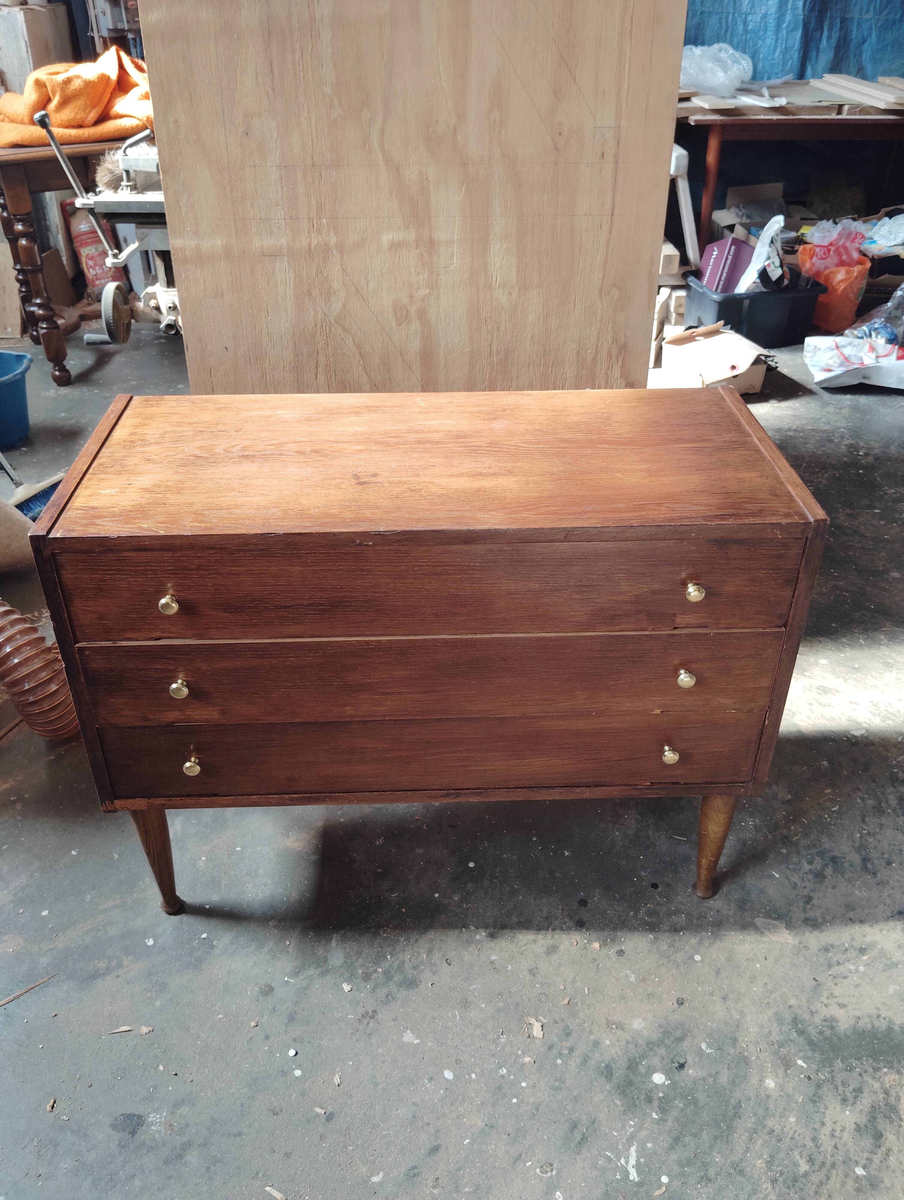 Vintage commode with tapered legs.
