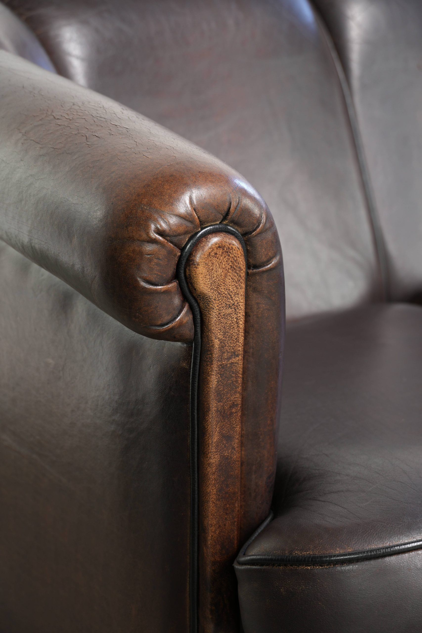 Unique sheepskin 3-seater sofa with deep colours and a distinctive design