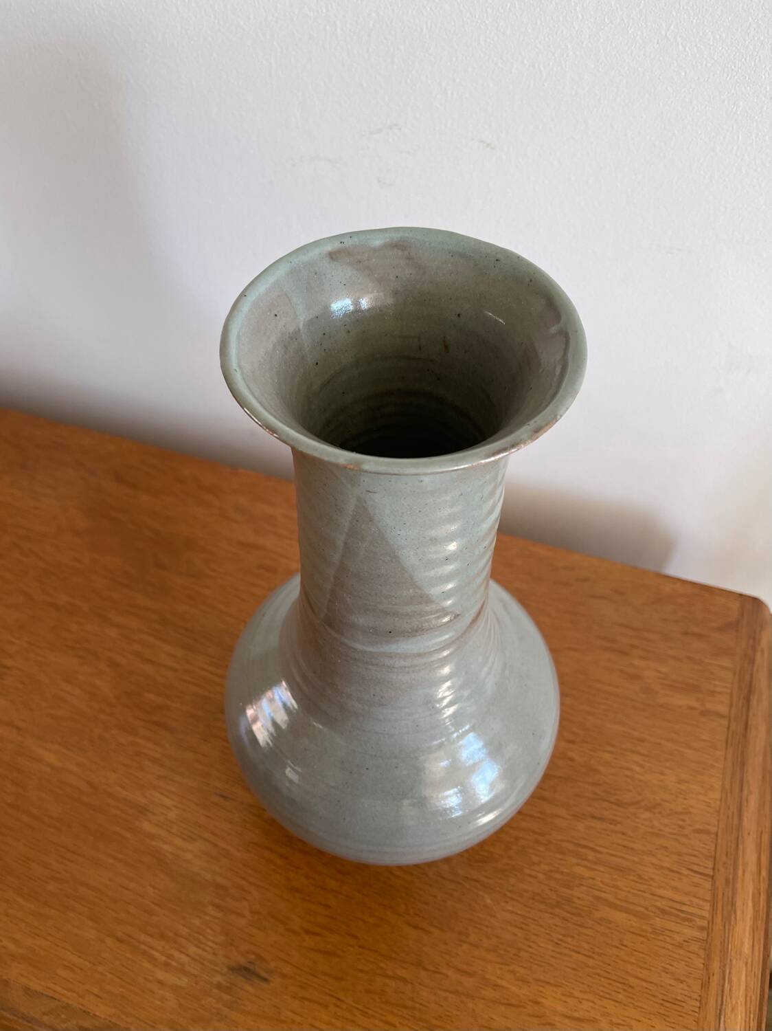 Glazed stoneware based, signed.