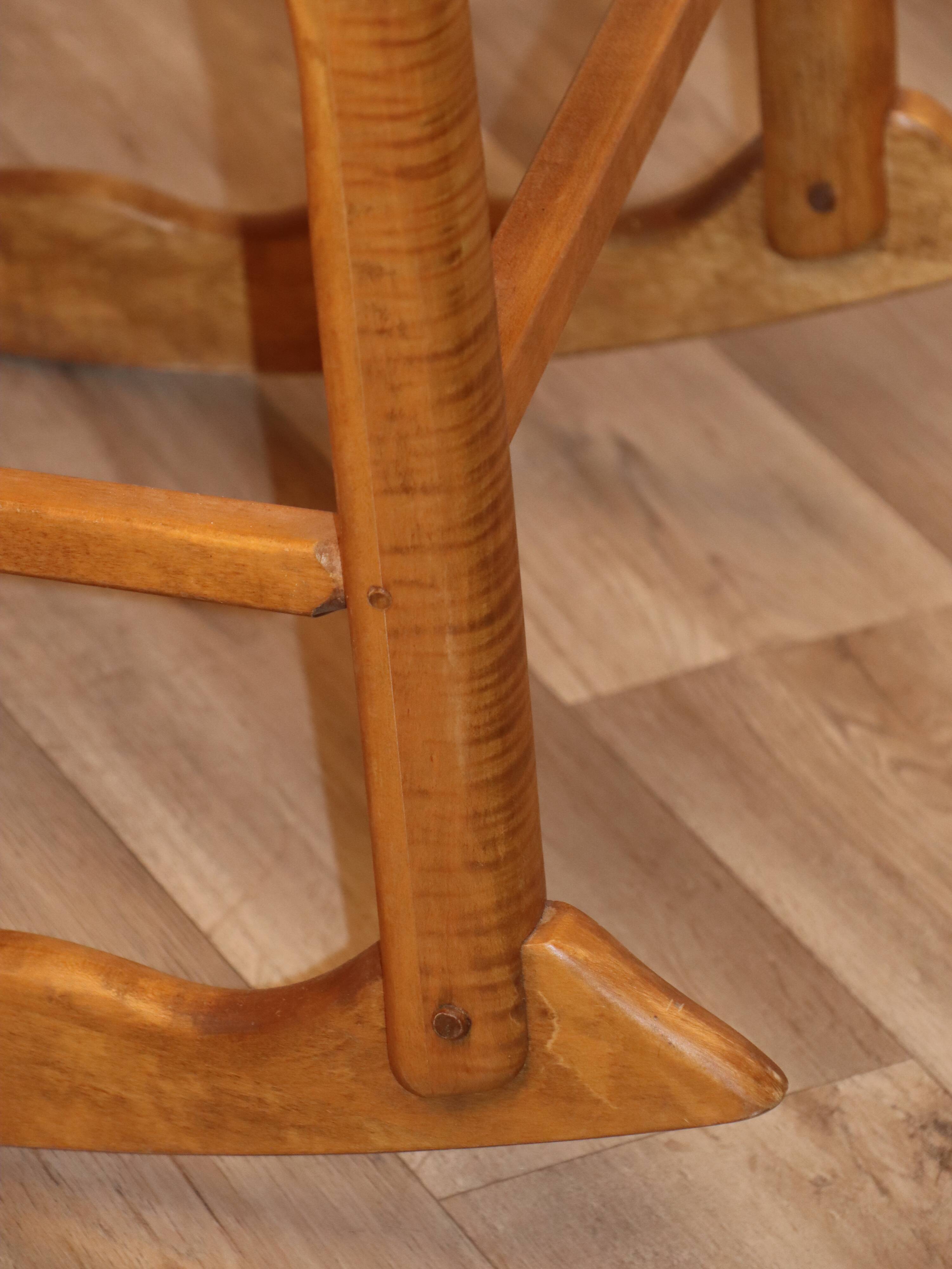 Vintage rocking chair in solid wood 1950