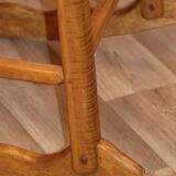 Vintage rocking chair in solid wood 1950