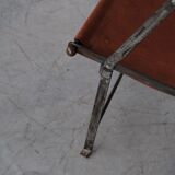 Pair of mid-century leather and metal folding armchairs