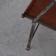 Pair of mid-century leather and metal folding armchairs